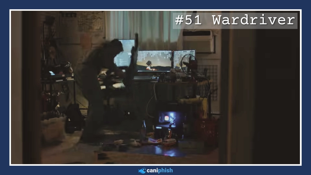 Image of Cole standing in a dimly lit room with computer equipment